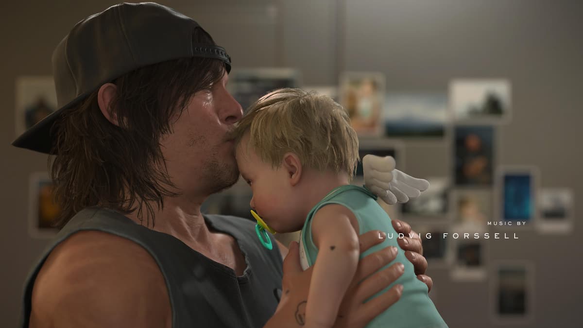 A man kissing a baby on the forehead in Death Stranding 2.