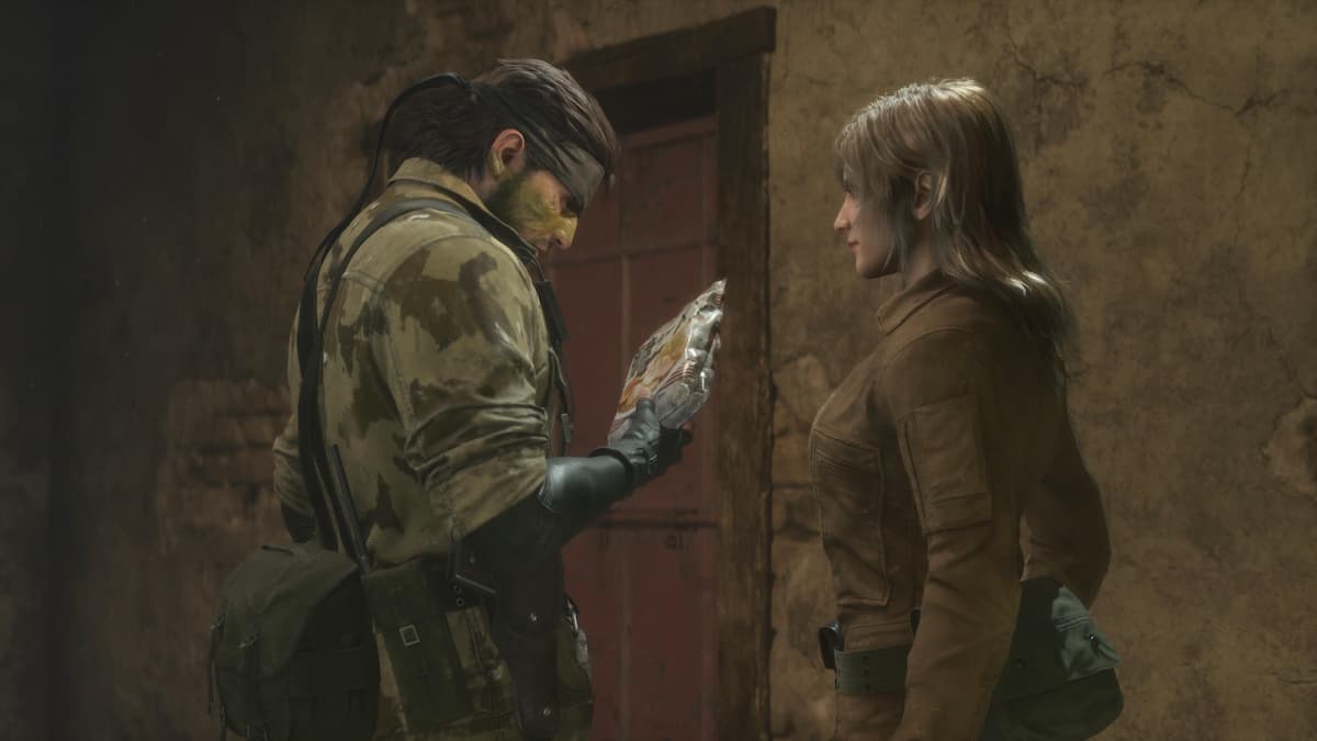 A man looking at a packet of instant noodles with a girl in front of him.