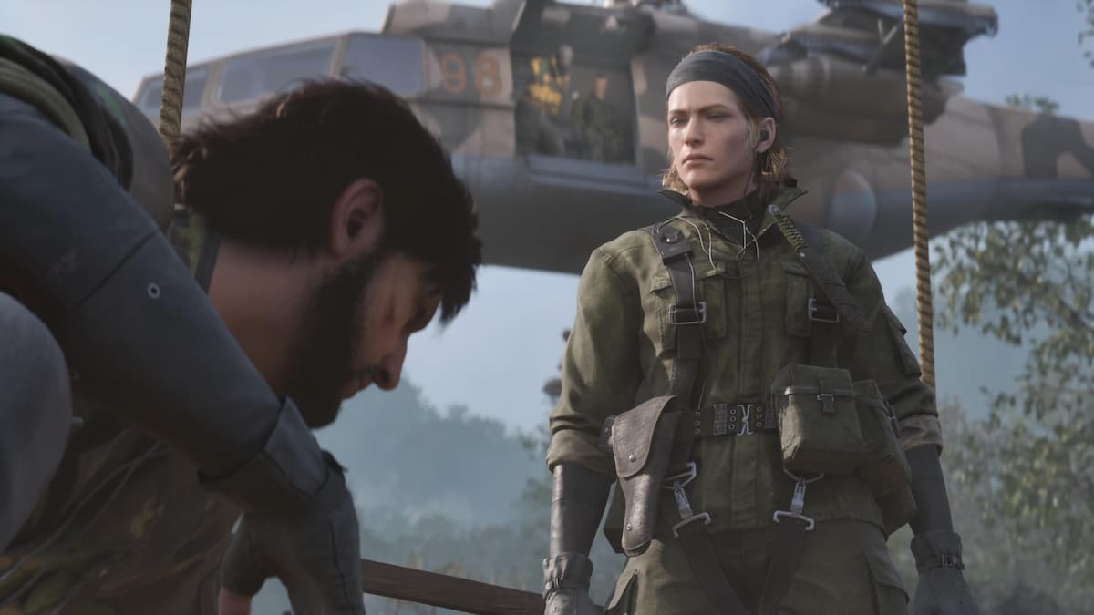 A woman in a dark green military outfit and a bandana. The Boss for our Metal Gear Solid Delta review.