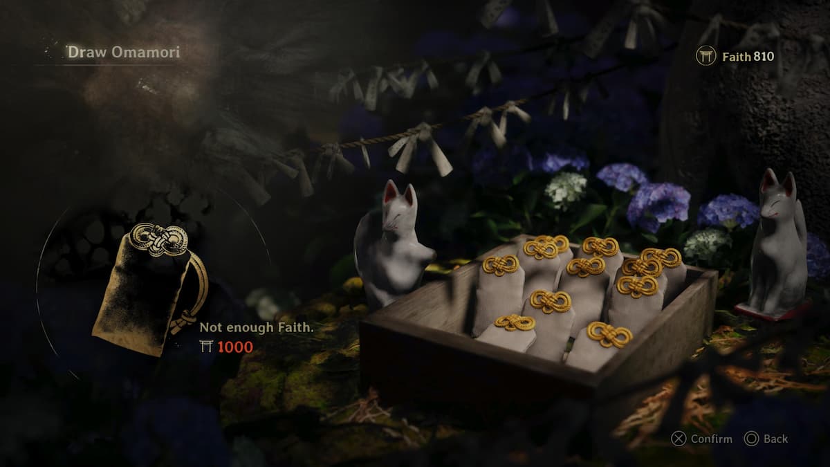 A ceramic fox next to a box of charms for our Silent Hill f Omamori guide.