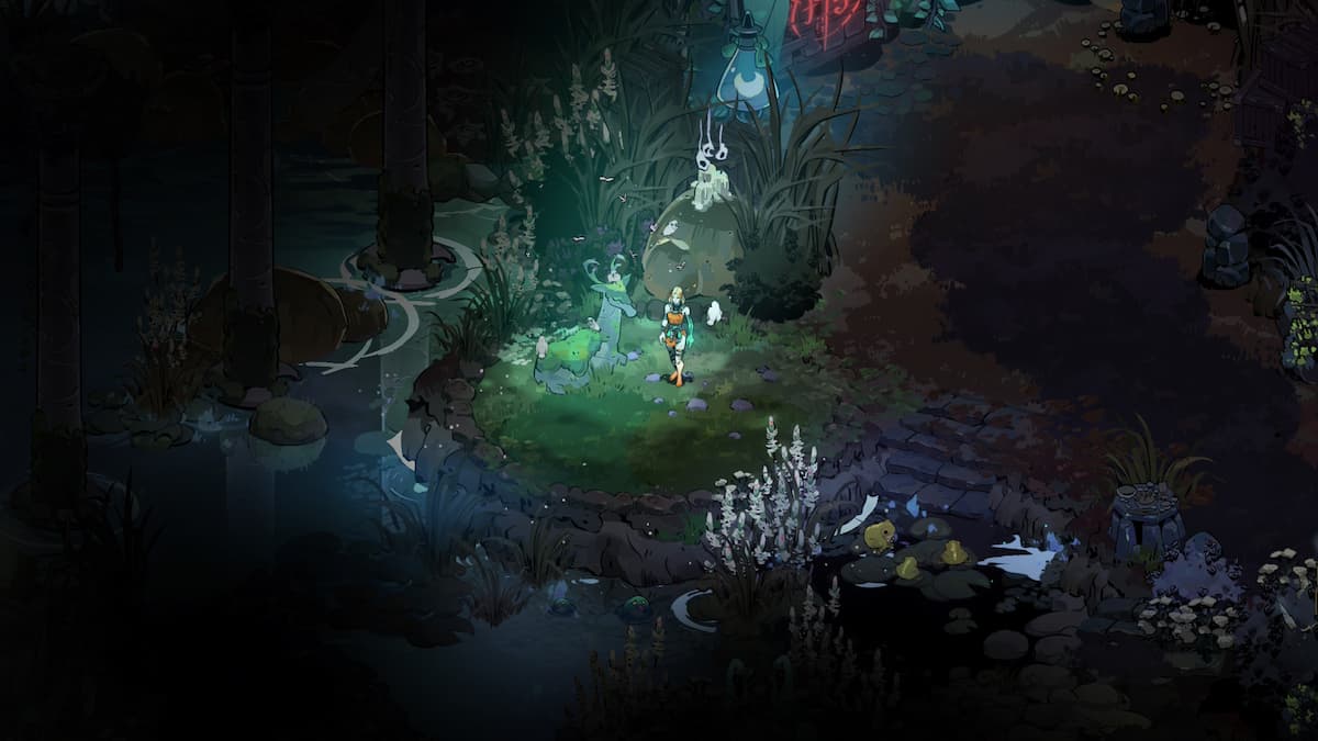 A woman standing next to a mossy deer statue for our Hades II review.