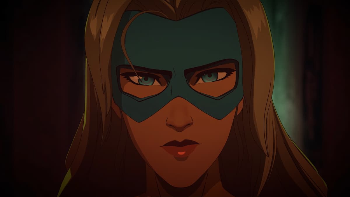 A close-up of a masked blonde woman. This is Blonde Blazer in Dispatch.