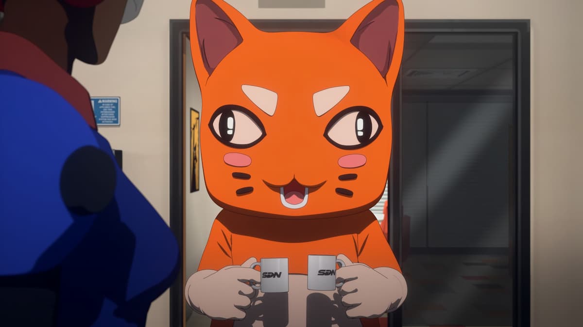 An orange cat holding a cup. Image for our Dispatch review.