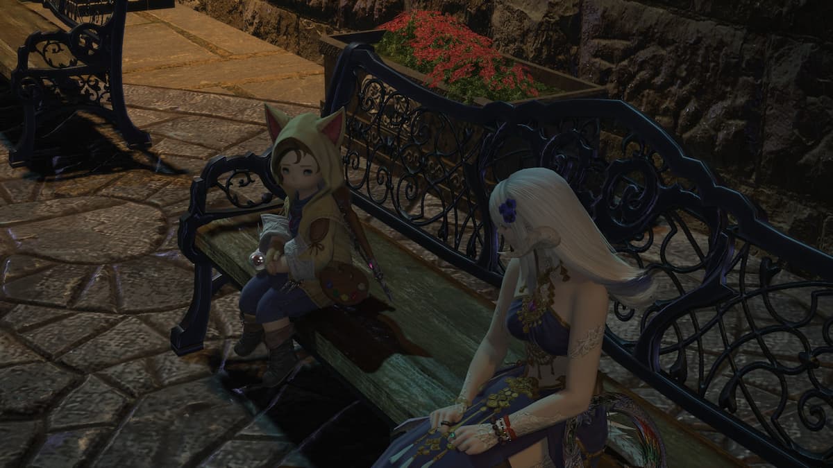 Two girls sitting on a bench.