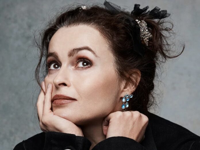 helena bonham carter A close-up of a woman with her hand on her face. Cover image for our The White Lotus Season 4 story.
