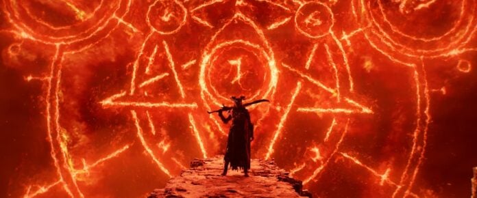 Warlock_Cinematic_05 A dark figure against a red background in Diablo IV.