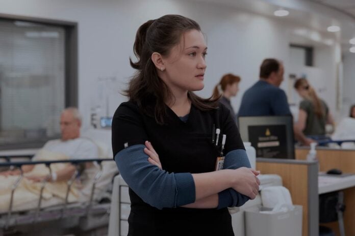 isa-briones(1) A woman with tied back hair in a hospital ER.