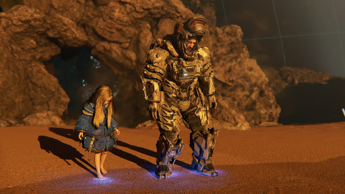 A man and a young girl standing at the beach.