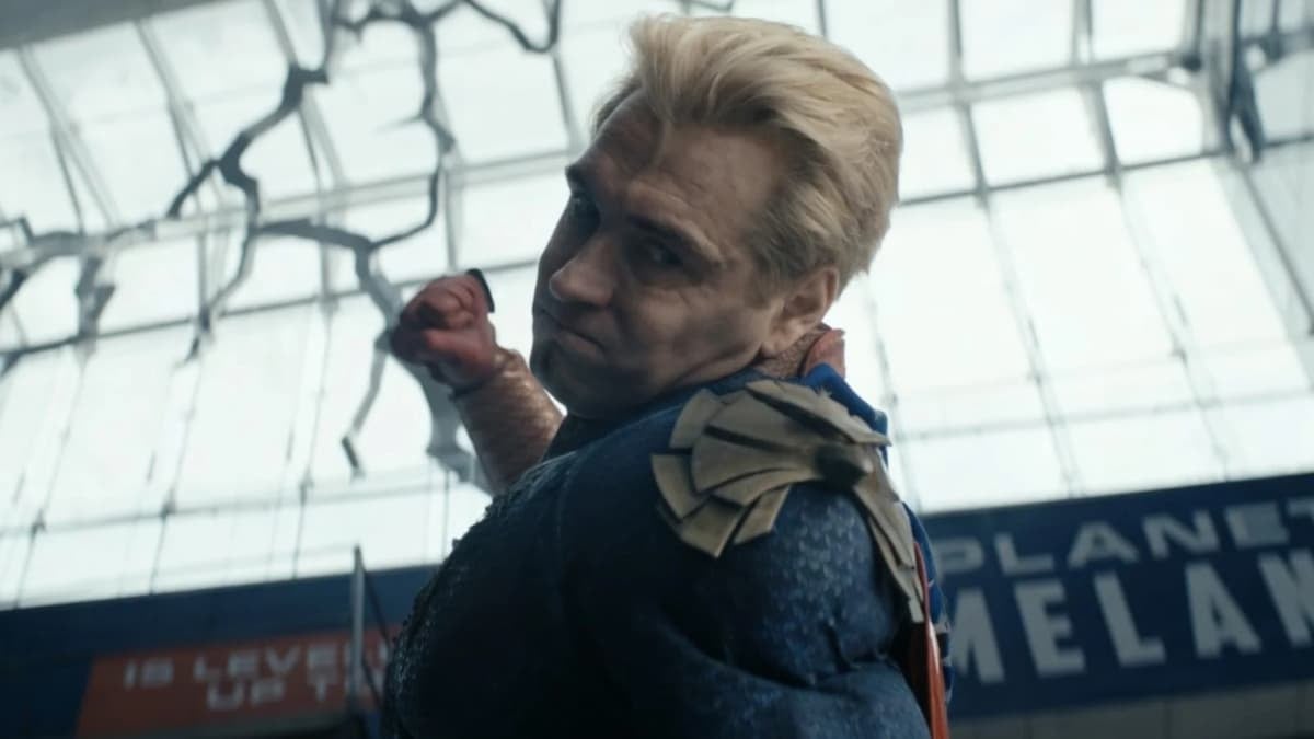 A man raising his fist to hit something