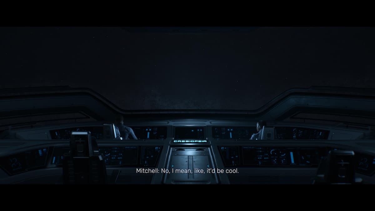 A wide shot of two pilots in a spaceship.