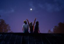 Mixtape: The Retcon Review Three people sitting on a roof at night. Cover image for our Mixtape review.