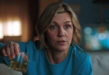 Pluribus Season 2 Gets an Update; “We’ll Learn More About the Atom Bomb” A woman holding a glass. Cover image for our Pluribus Season 2 story.