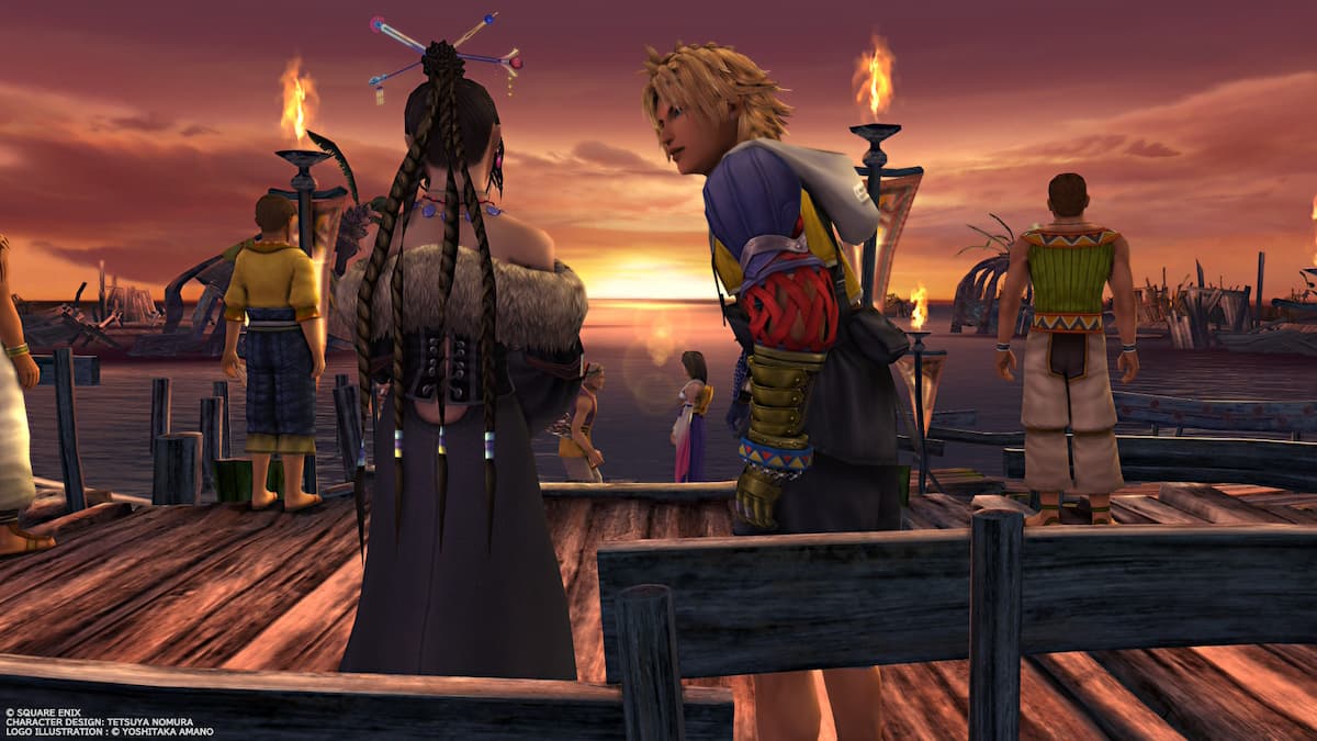 A boy talking to a woman on a bridge at sunset