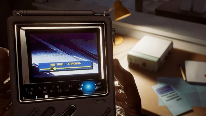 silent hill townfall Hands holding a radio