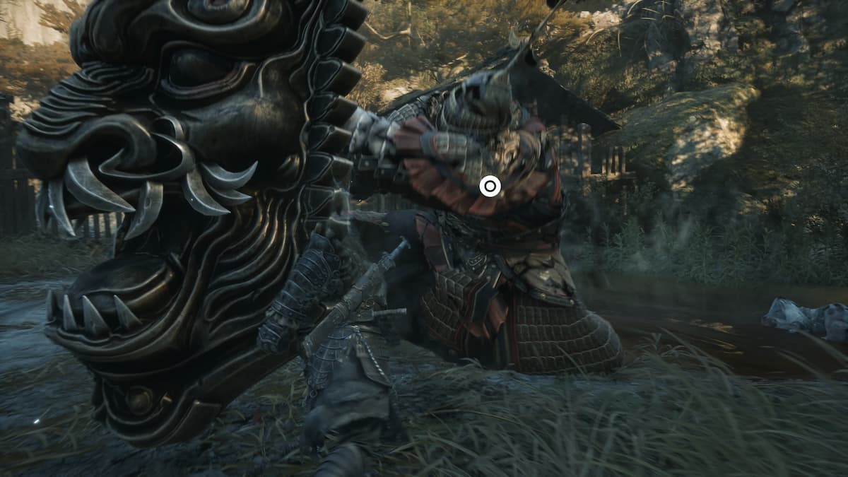 A man holding a large shield